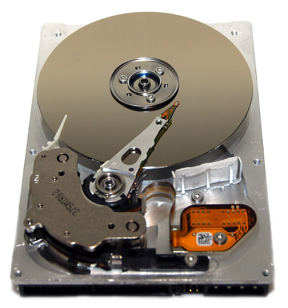 Hard drive with a wrench repairing it