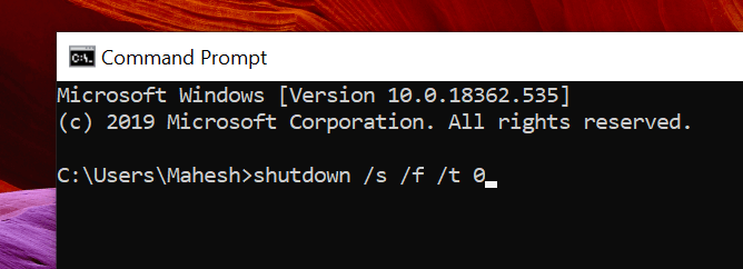 Open the Command Prompt by typing "cmd" in the search bar and selecting it from the search results.
Type the command "shutdown /s /f /t 0" and press Enter to force shutdown the computer immediately.